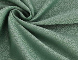 Reststck-Wollsatin-Jacquard-knitterfrei-Ornamentmuster---dunkles-mintgrn-salbei-seegrn---100-cm
