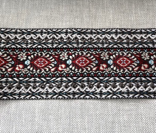 Bild 1 von Borte Jacquardband Zierborte - schwarz rot gemustert  7 cm breit