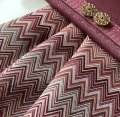 Bild 2 von Jacquardstoff Gobelin Dirndl Stoff  - knitterfrei -  Zackenmuster -Rottöne  190 cm